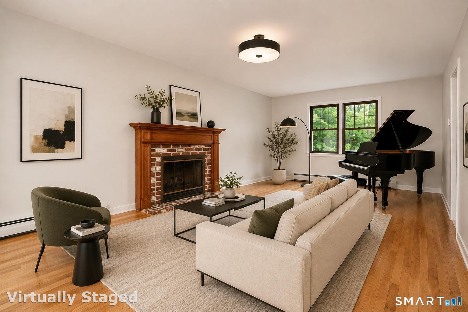 185 Nepas Road Fairfield, CT 06825 - Photo 6 of 38 Enjoy quiet time , tea , drinks with guests in your living room anchored by a wood fireplace . Plenty of space to do it all!