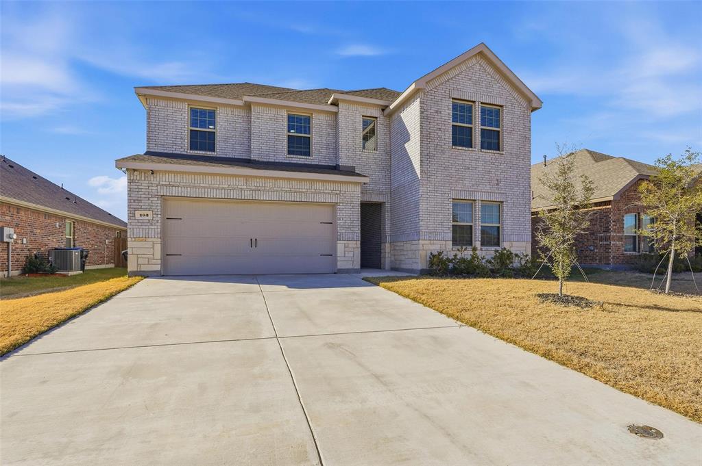 103 Lantern Road Caddo Mills, TX 75135 - Photo 2 of 33 a front view of a house with a yard