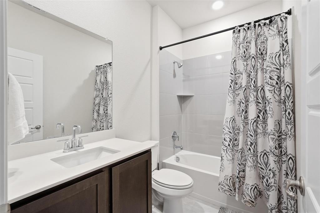 103 Lantern Road Caddo Mills, TX 75135 - Photo 25 of 33 a bathroom with a sink and a toilet