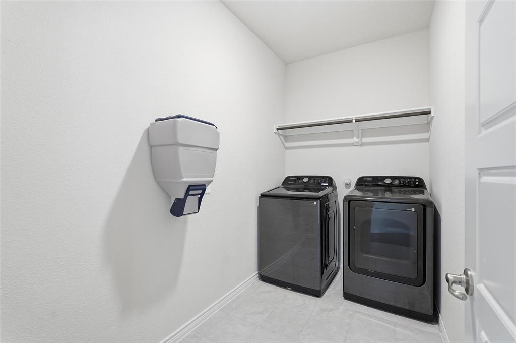 103 Lantern Road Caddo Mills, TX 75135 - Photo 27 of 33 a view of a storage & utility room with washer and dryer