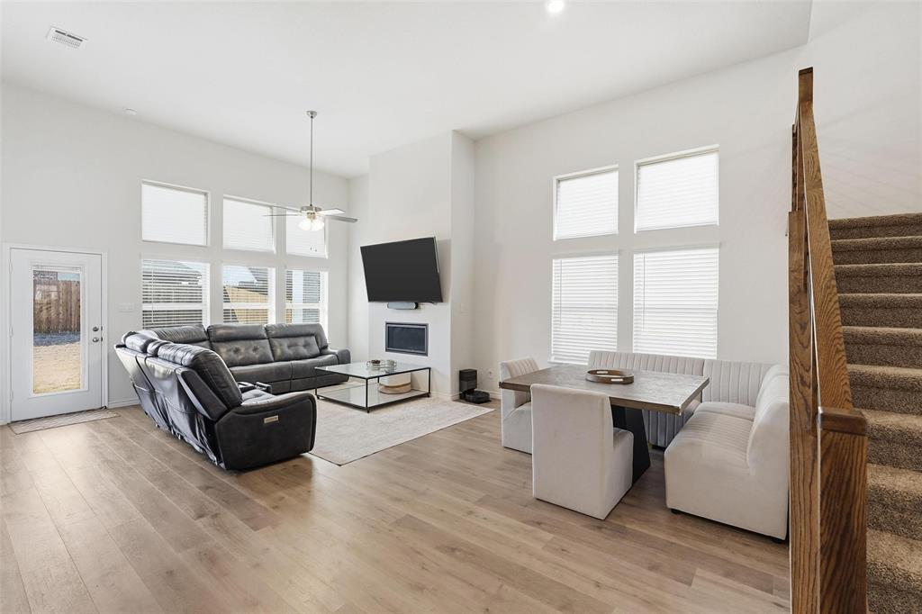 103 Lantern Road Caddo Mills, TX 75135 - Photo 7 of 33 a living room with furniture flat screen tv and window