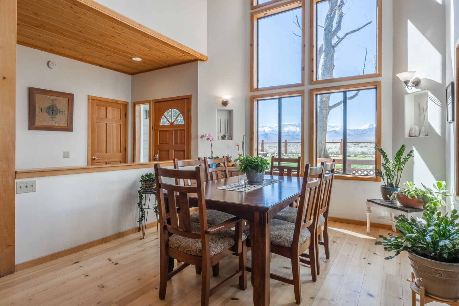 150 Hardy Road Bishop, CA 93514 - Photo 15 of 35 a view of a dining room with furniture window and wooden floor