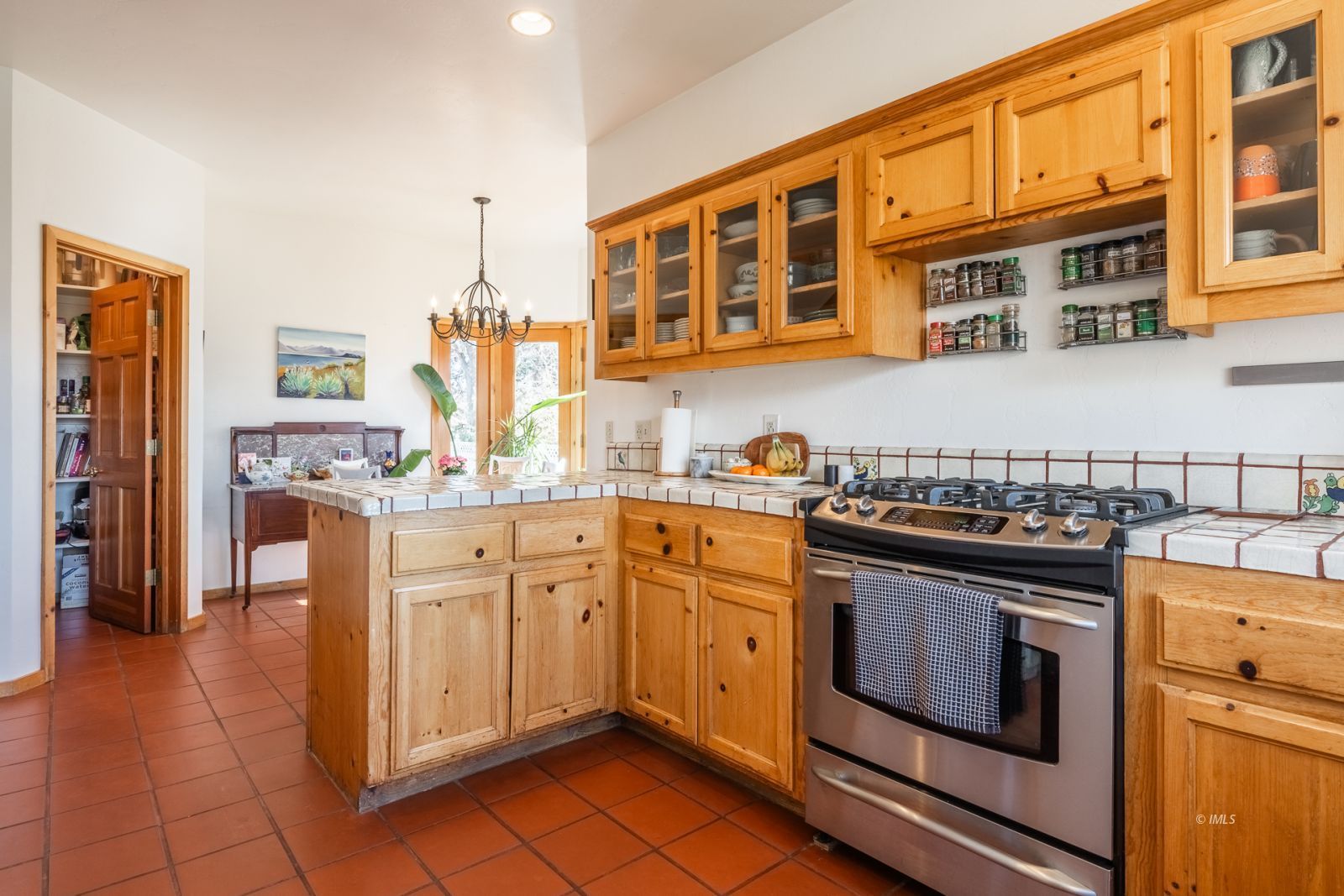 150 Hardy Road Bishop, CA 93514 - Photo 20 of 35 a kitchen with stainless steel appliances granite countertop a stove and a sink