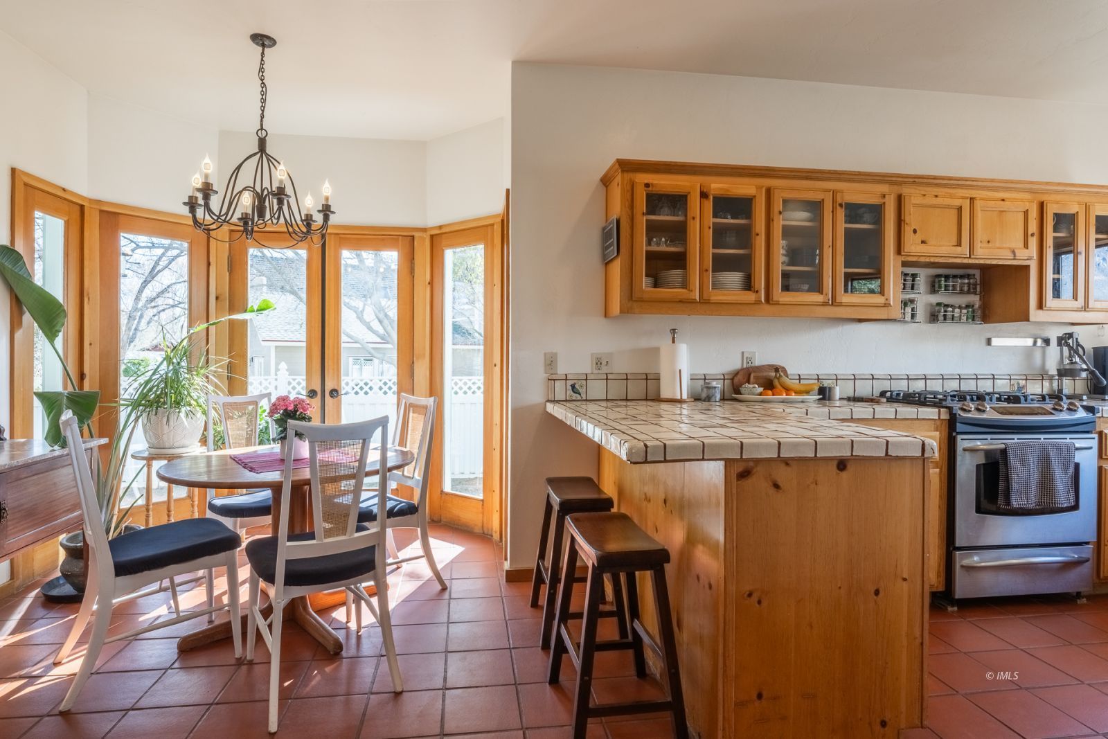 150 Hardy Road Bishop, CA 93514 - Photo 21 of 35 a dining room with stainless steel appliances granite countertop a stove and a dining table with the kitchen view