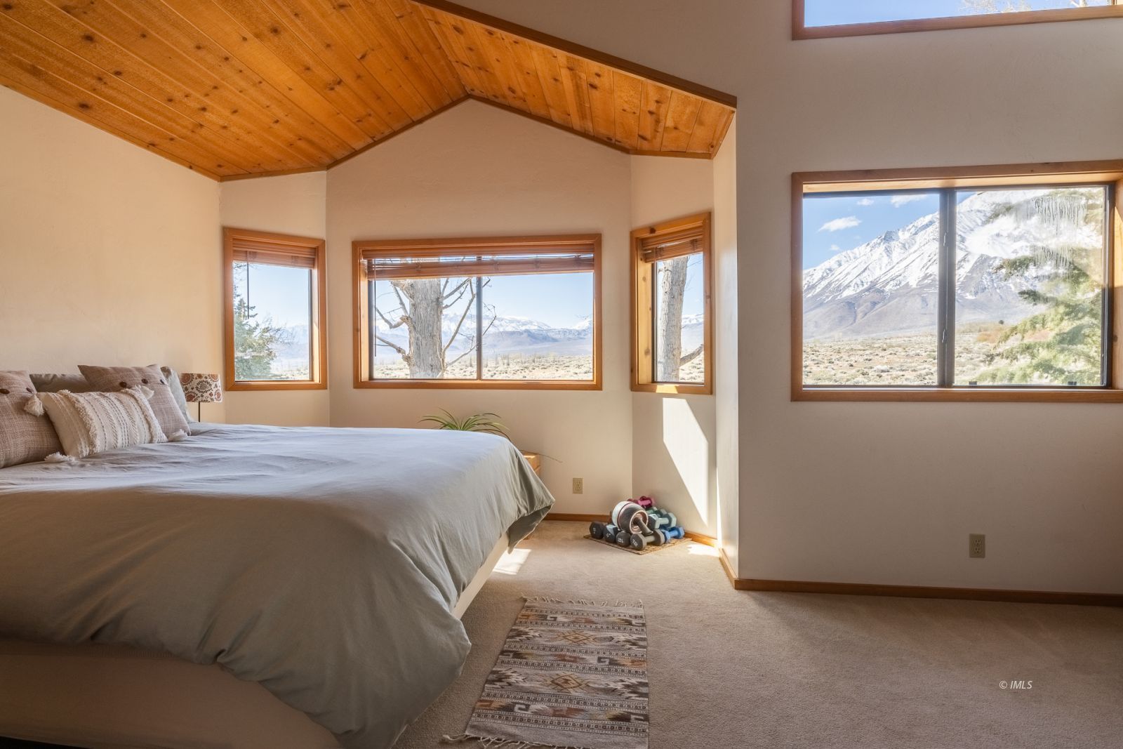 150 Hardy Road Bishop, CA 93514 - Photo 22 of 35 a bedroom with a bed and a large window