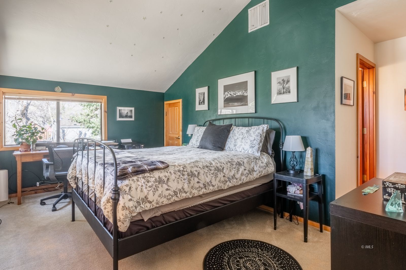 150 Hardy Road Bishop, CA 93514 - Photo 25 of 35 a bed sitting in a bedroom next to a window