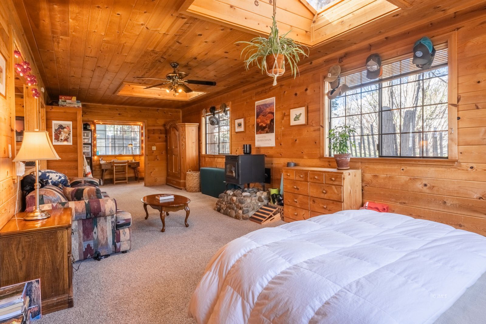 150 Hardy Road Bishop, CA 93514 - Photo 29 of 35 a bedroom with furniture and a chandelier
