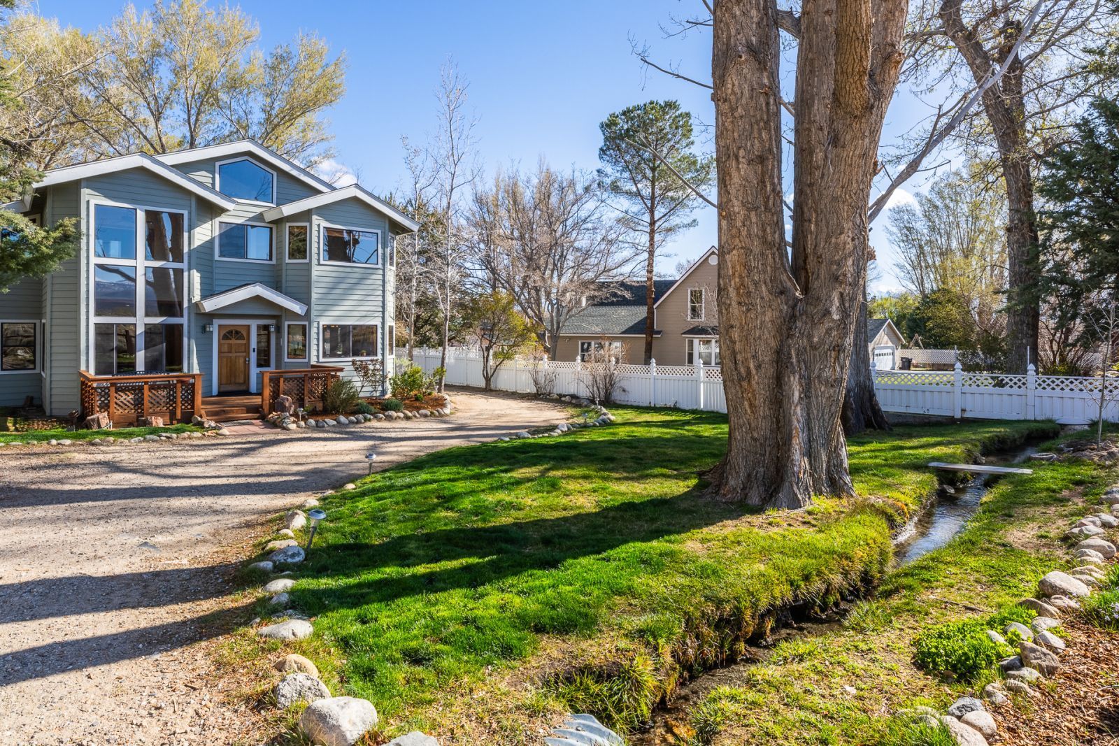 150 Hardy Road Bishop, CA 93514 - Photo 3 of 35 a front view of a house with a yard table and chairs