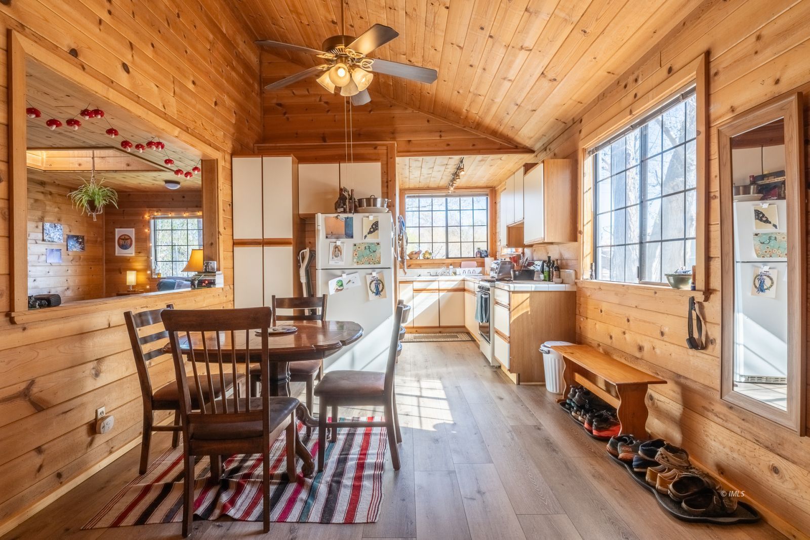 150 Hardy Road Bishop, CA 93514 - Photo 31 of 35 a view of a dining room with furniture window and wooden floor