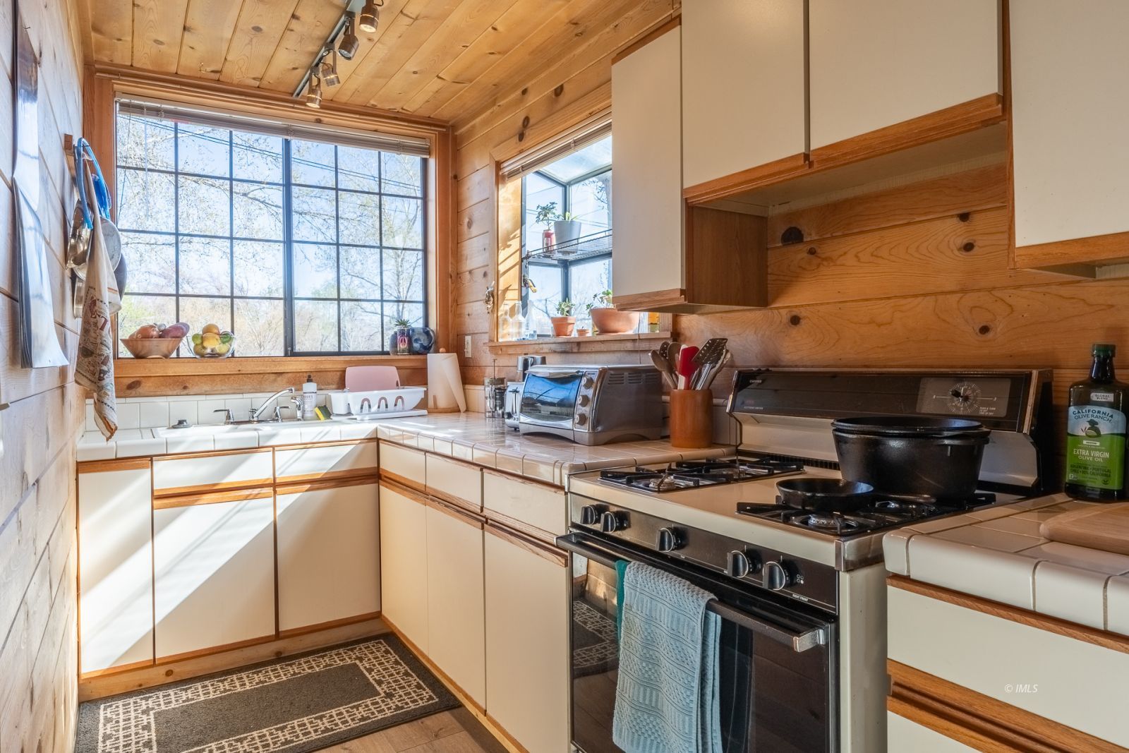 150 Hardy Road Bishop, CA 93514 - Photo 32 of 35 a kitchen with stainless steel appliances granite countertop a stove and a sink