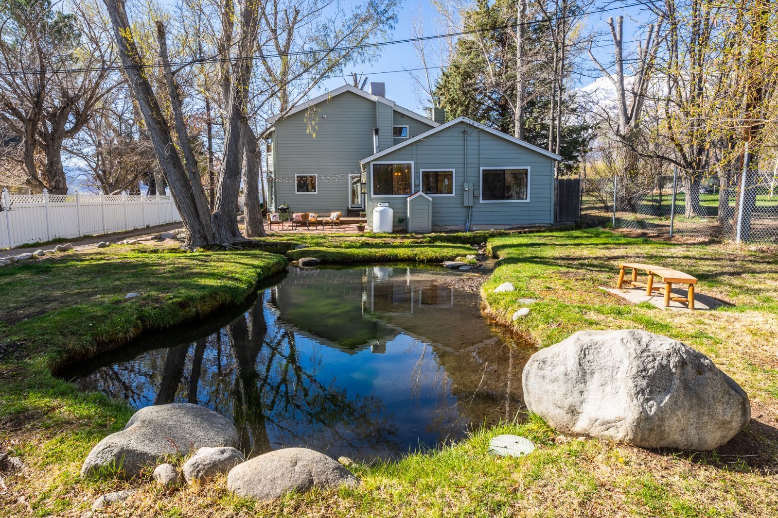 150 Hardy Road Bishop, CA 93514 - Photo 6 of 35 a swimming pool with outdoor seating and yard