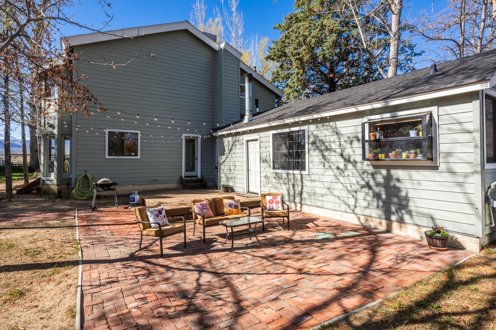 150 Hardy Road Bishop, CA 93514 - Photo 7 of 35 a backyard of a house with outdoor seating