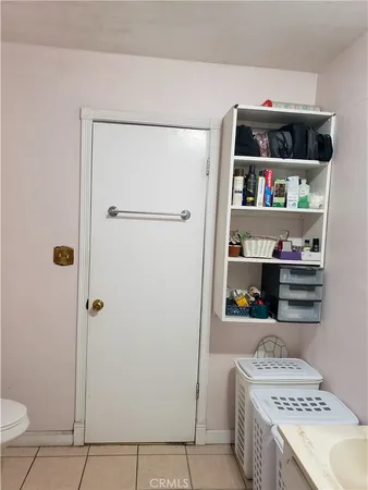 a storage room with washer and dryer
