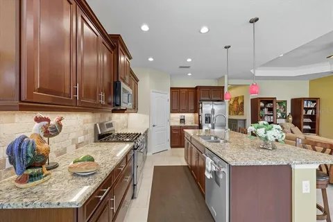 a kitchen with granite countertop lots of counter top space