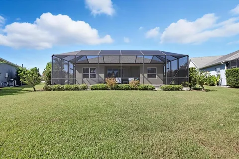 a front view of building with yard