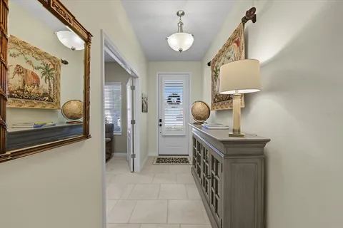a bathroom with a sink a mirror and shower