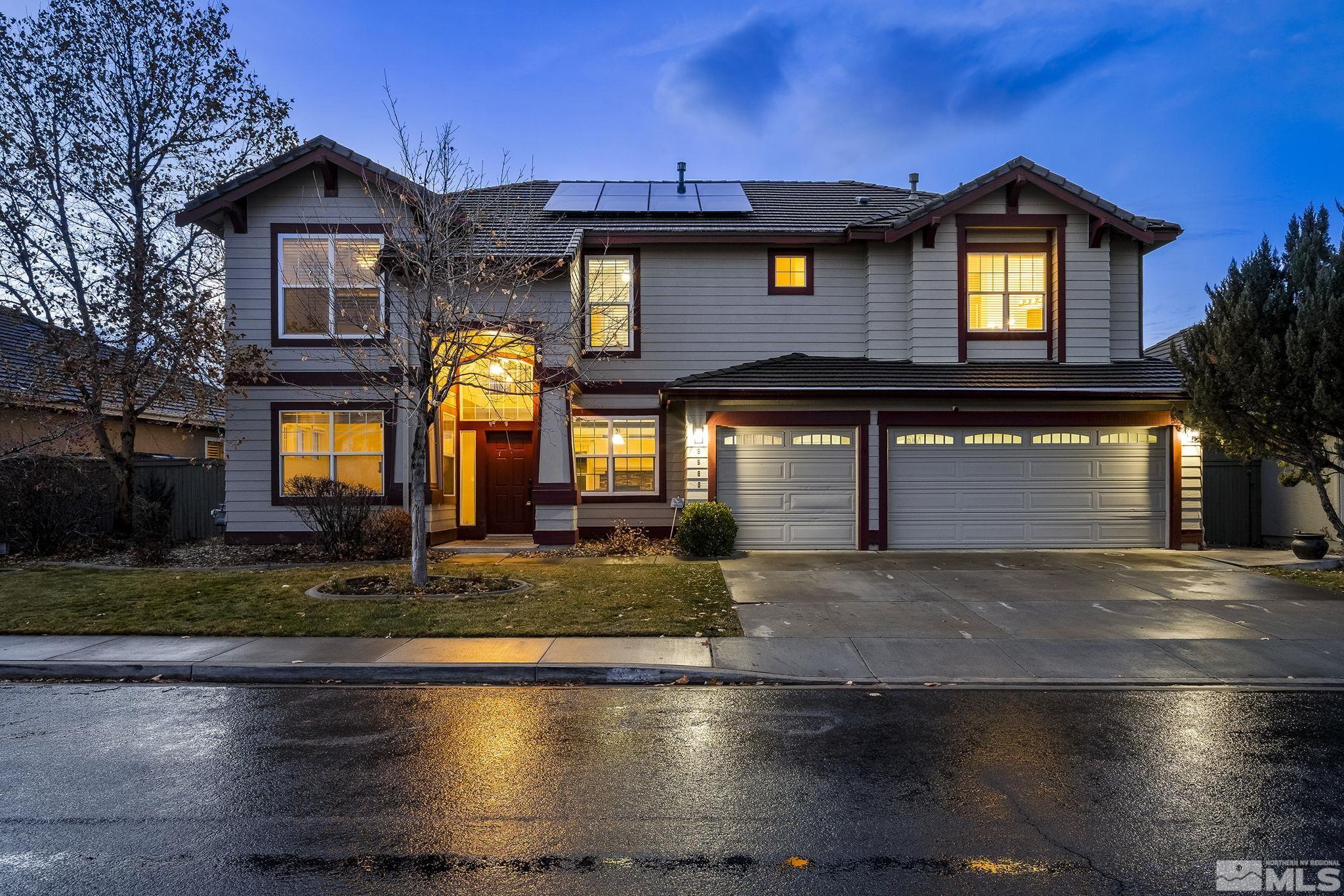 9965 Bandana Way Reno, NV 89521 - Photo 1 of 40 a front view of a house with yard