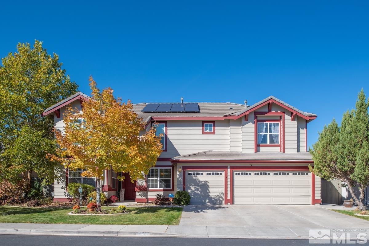 9965 Bandana Way Reno, NV 89521 - Photo 2 of 40 a front view of a house with a yard