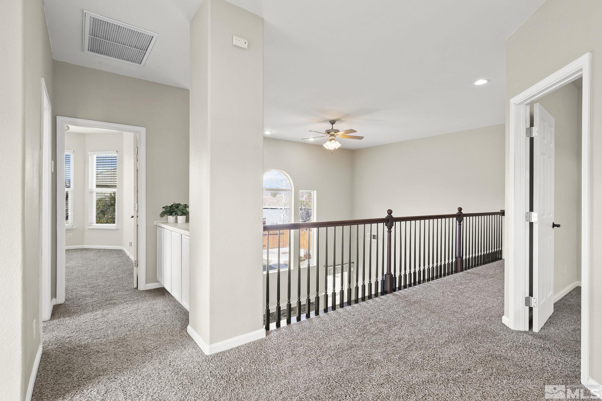9965 Bandana Way Reno, NV 89521 - Photo 25 of 40 a view of a hallway with a livingroom and entryway