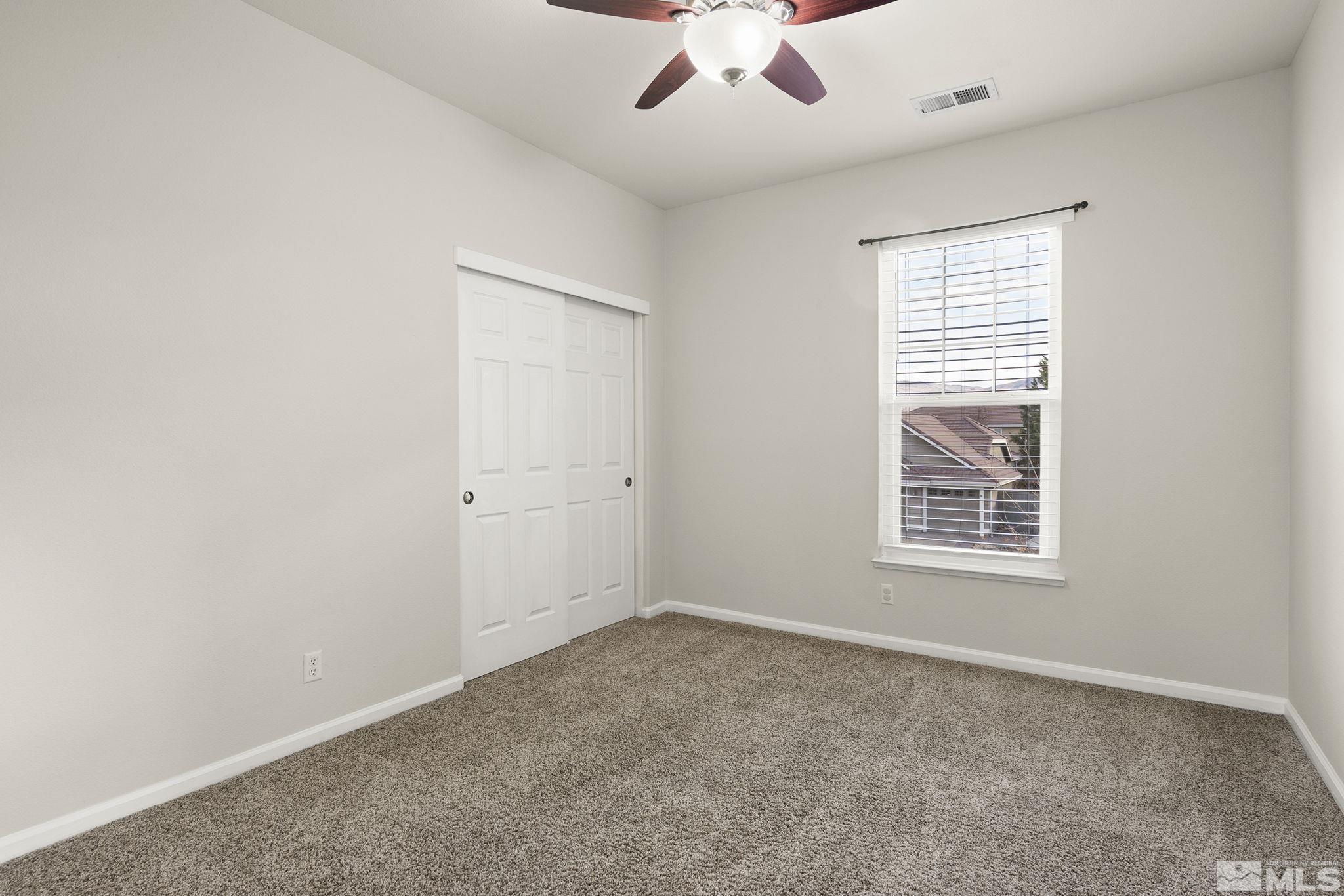 9965 Bandana Way Reno, NV 89521 - Photo 29 of 40 a view of an empty room with a window
