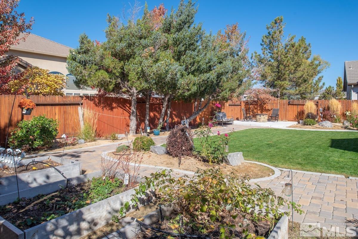 9965 Bandana Way Reno, NV 89521 - Photo 35 of 40 front view of a house with a yard