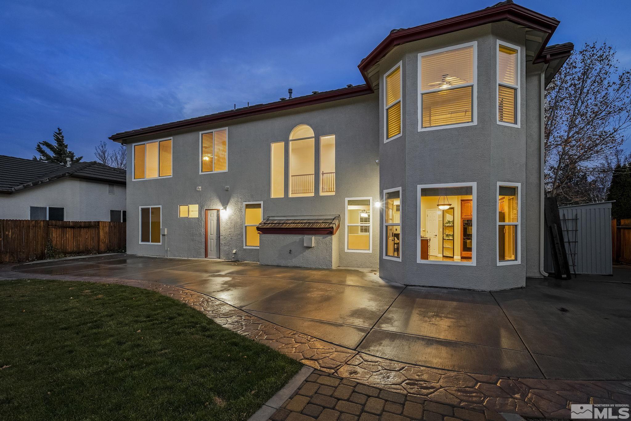 9965 Bandana Way Reno, NV 89521 - Photo 39 of 40 a front view of a house with a yard