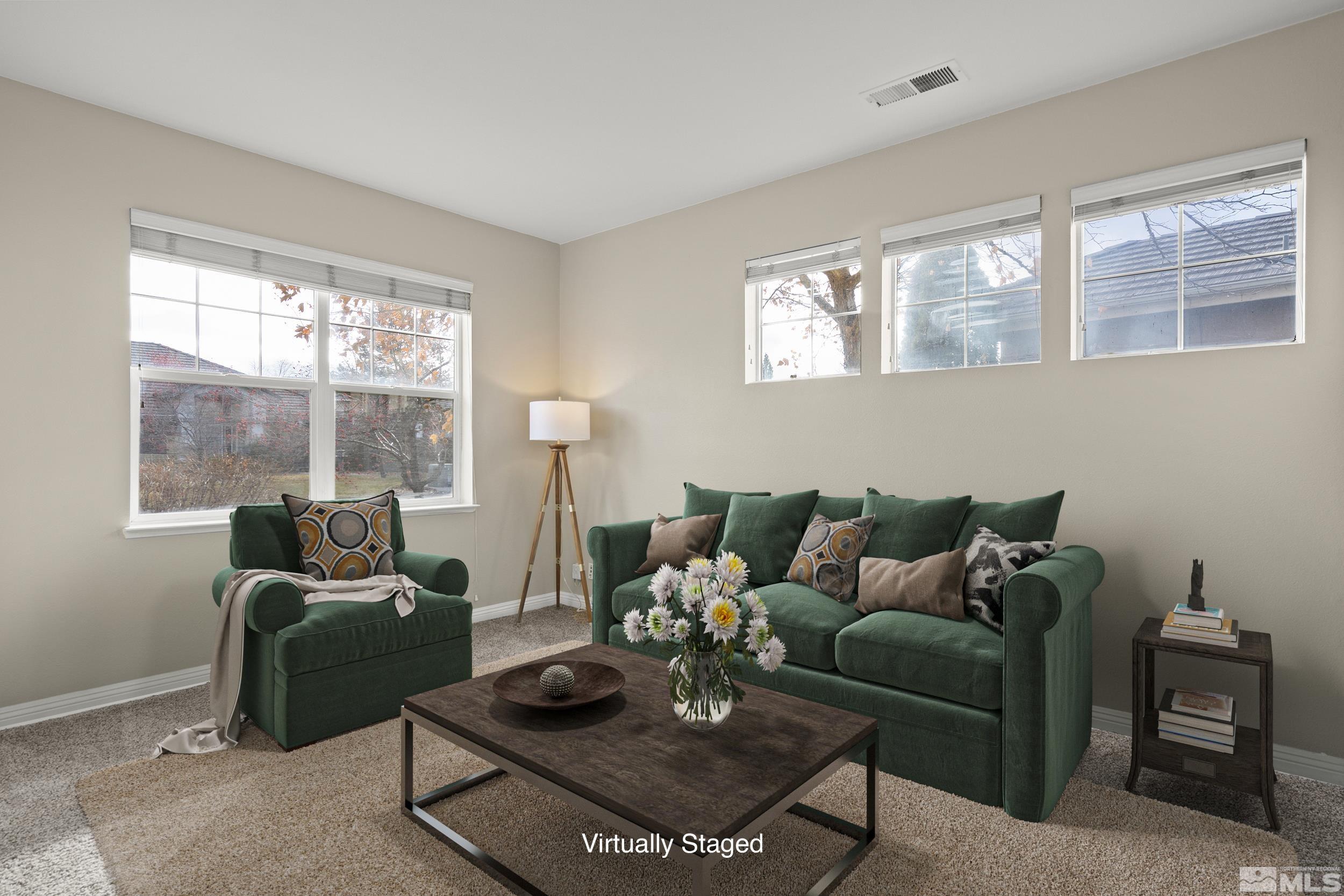 9965 Bandana Way Reno, NV 89521 - Photo 6 of 40 a living room with furniture and a large window