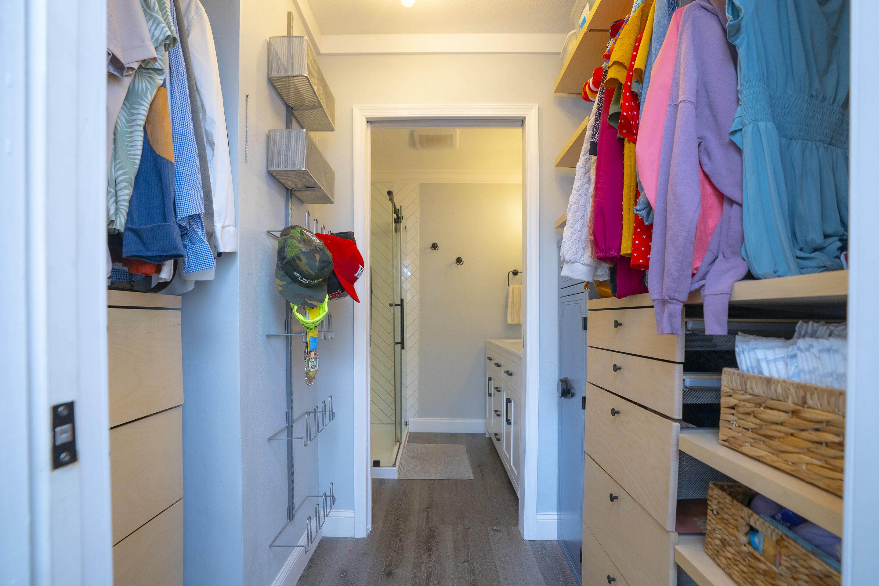 55 Ed Swift Road Key West, FL 33040 - Photo 11 of 23 a view of walk in closet with clothes and shoes