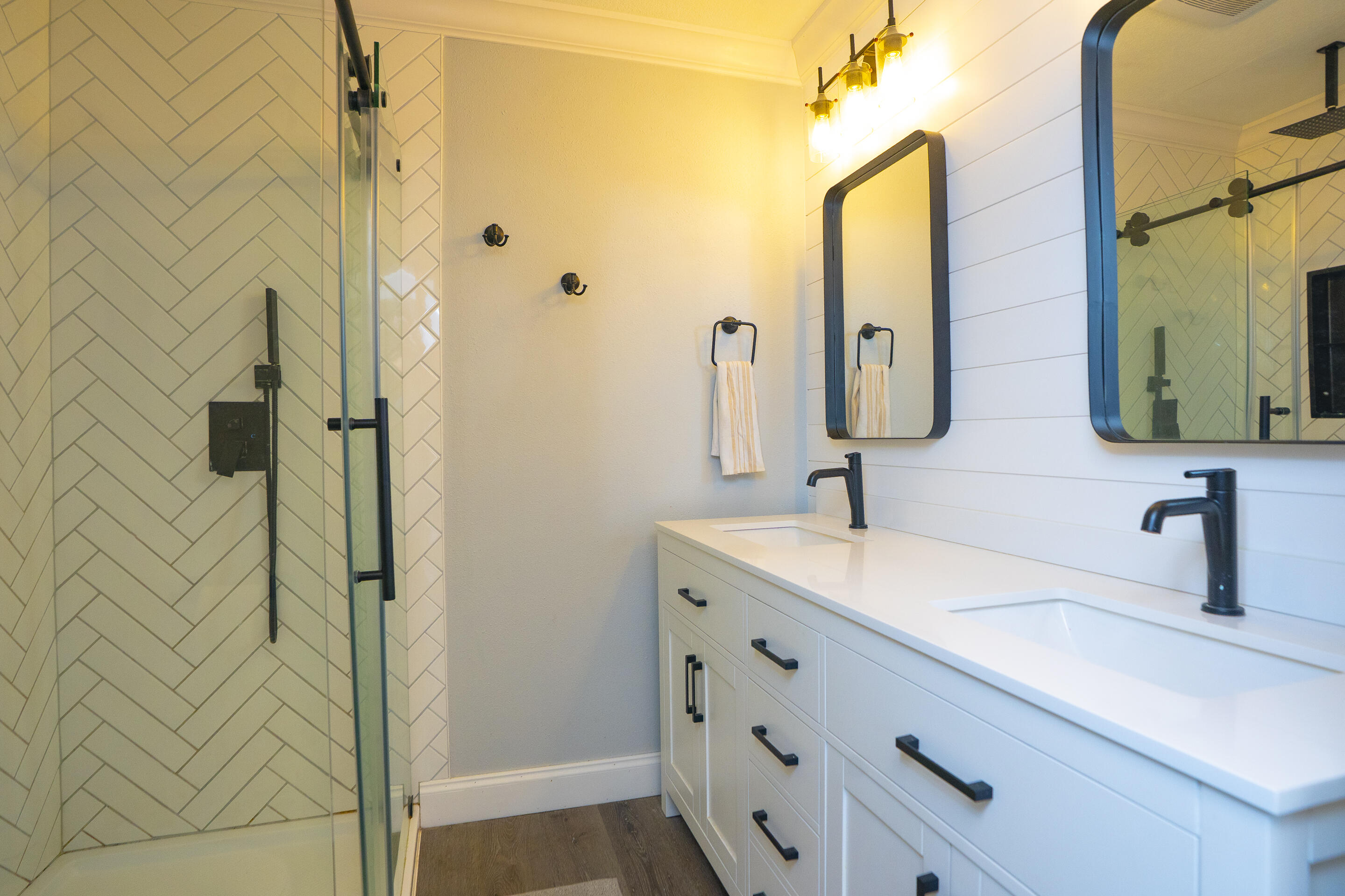 55 Ed Swift Road Key West, FL 33040 - Photo 13 of 23 a bathroom with double vanity sink and a mirror