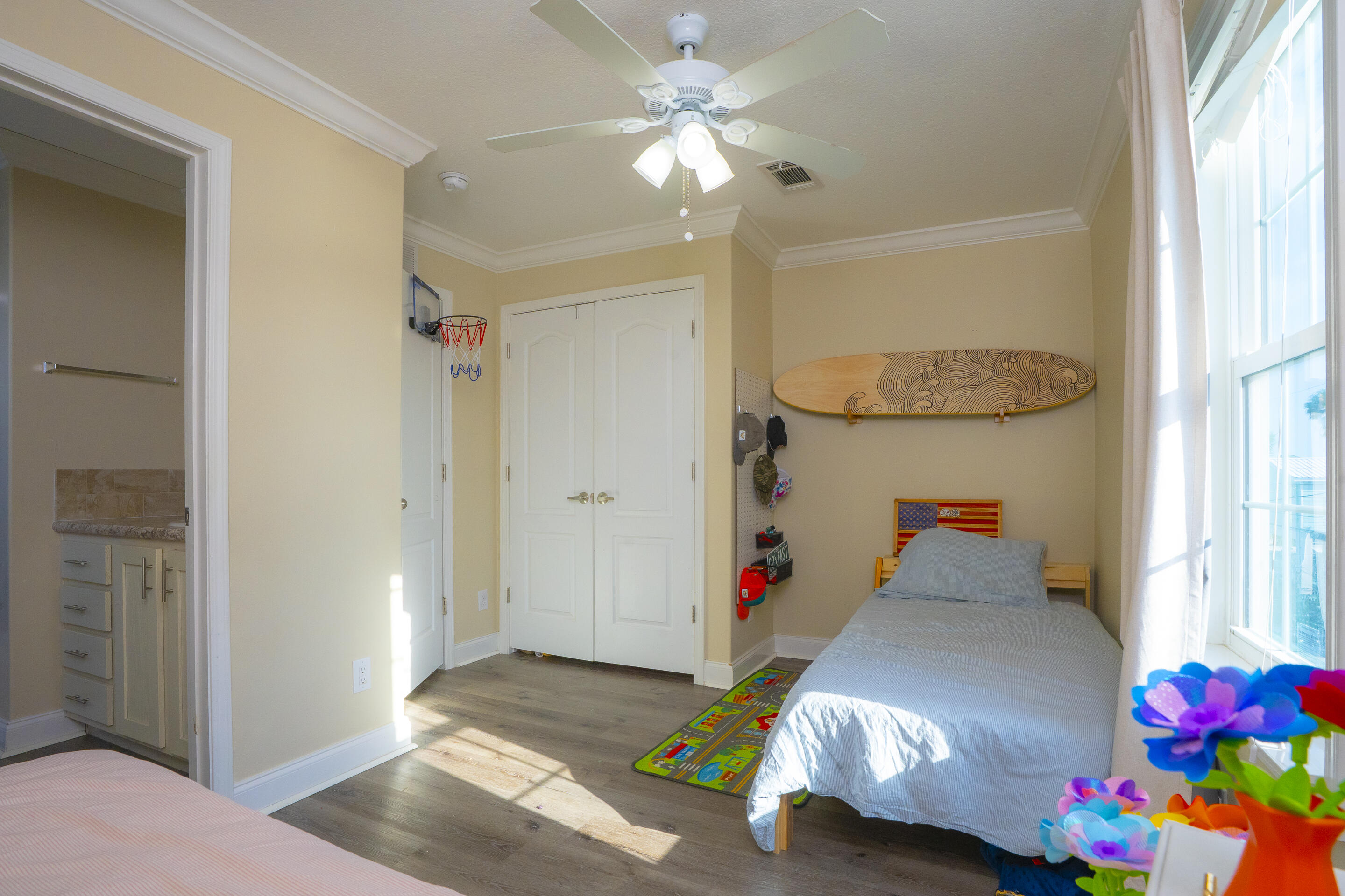 55 Ed Swift Road Key West, FL 33040 - Photo 15 of 23 a view of kids room with toys and a window