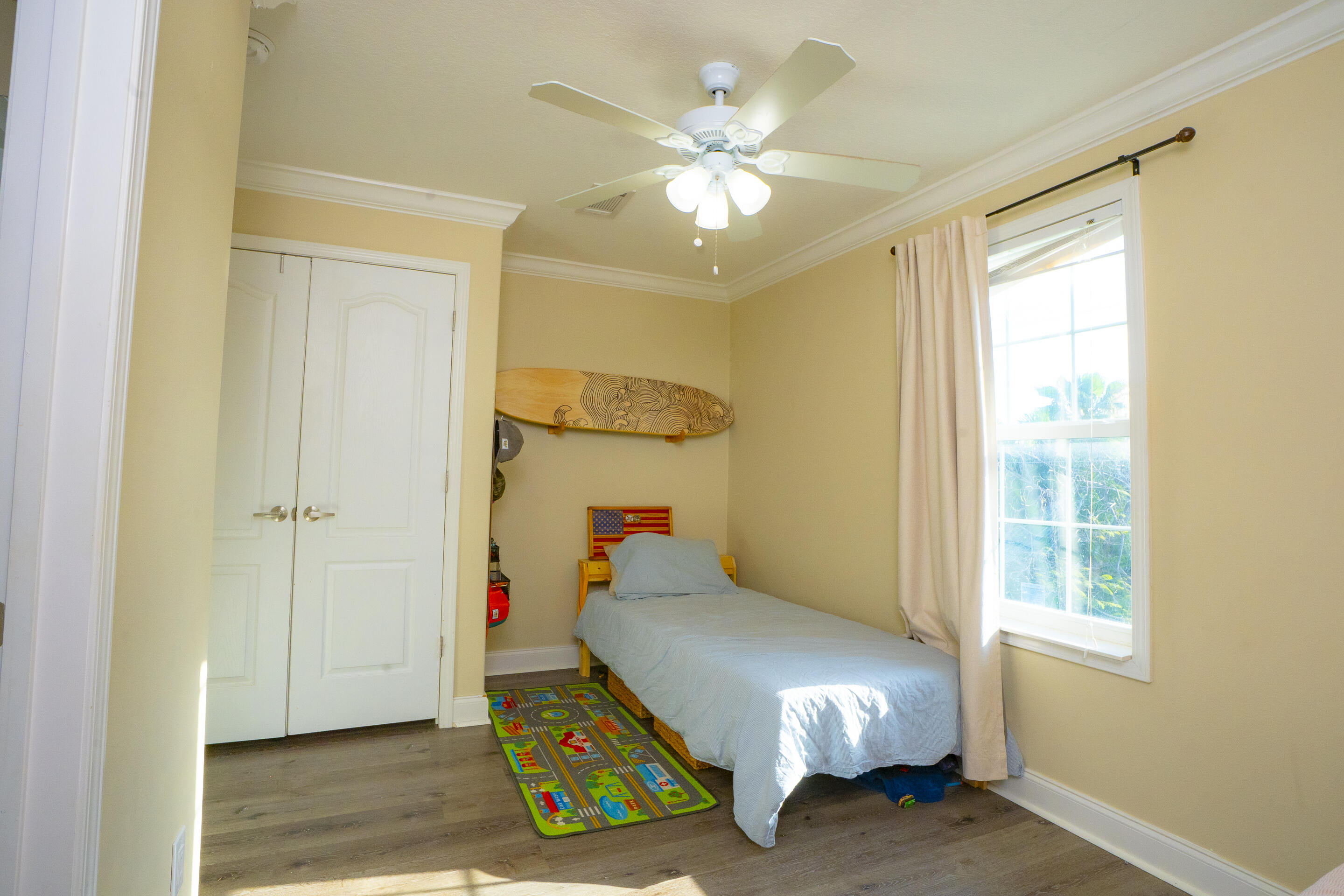 55 Ed Swift Road Key West, FL 33040 - Photo 15 of 23 a bedroom with a bed and a window