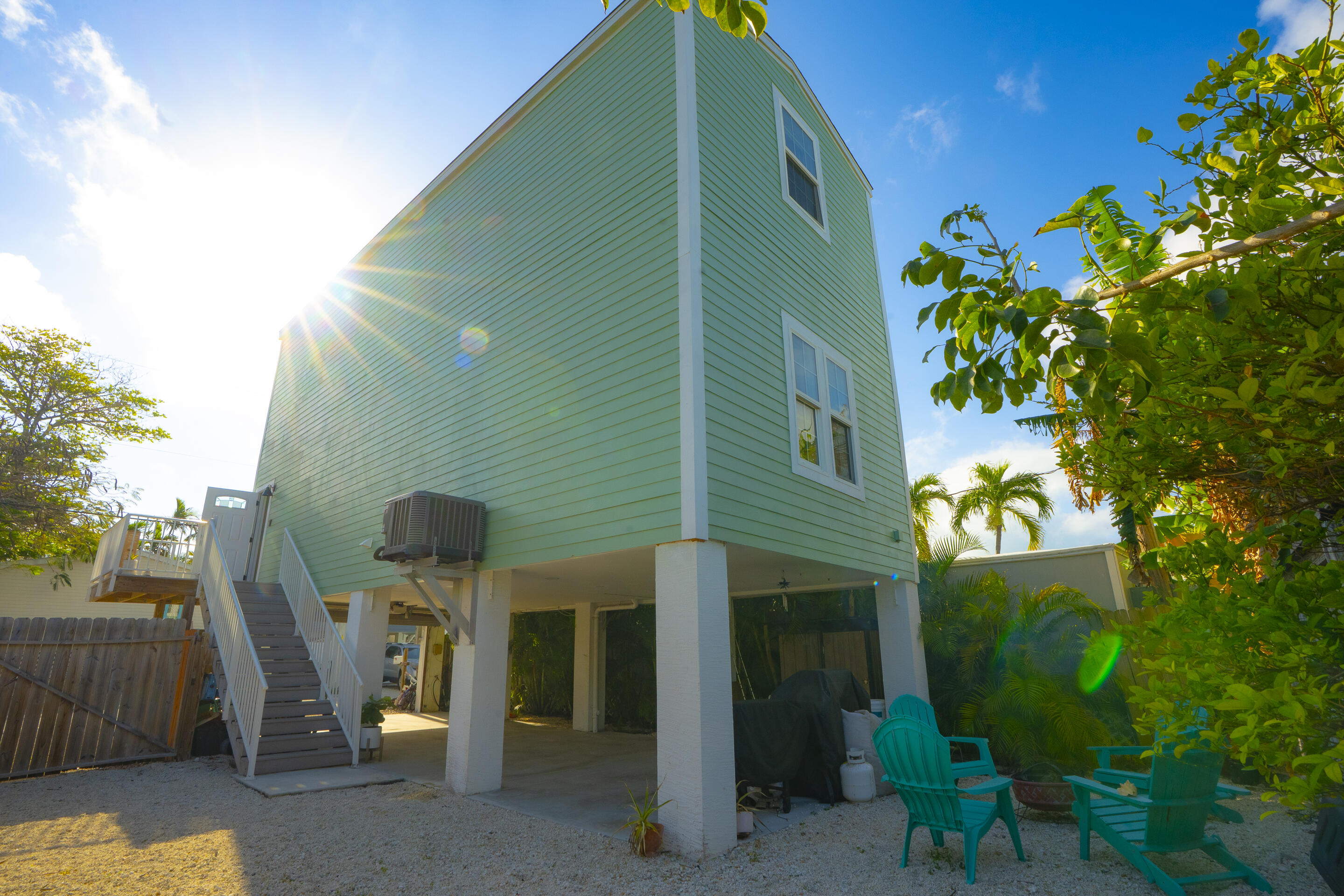 55 Ed Swift Road Key West, FL 33040 - Photo 2 of 23 a front view of a house with garden