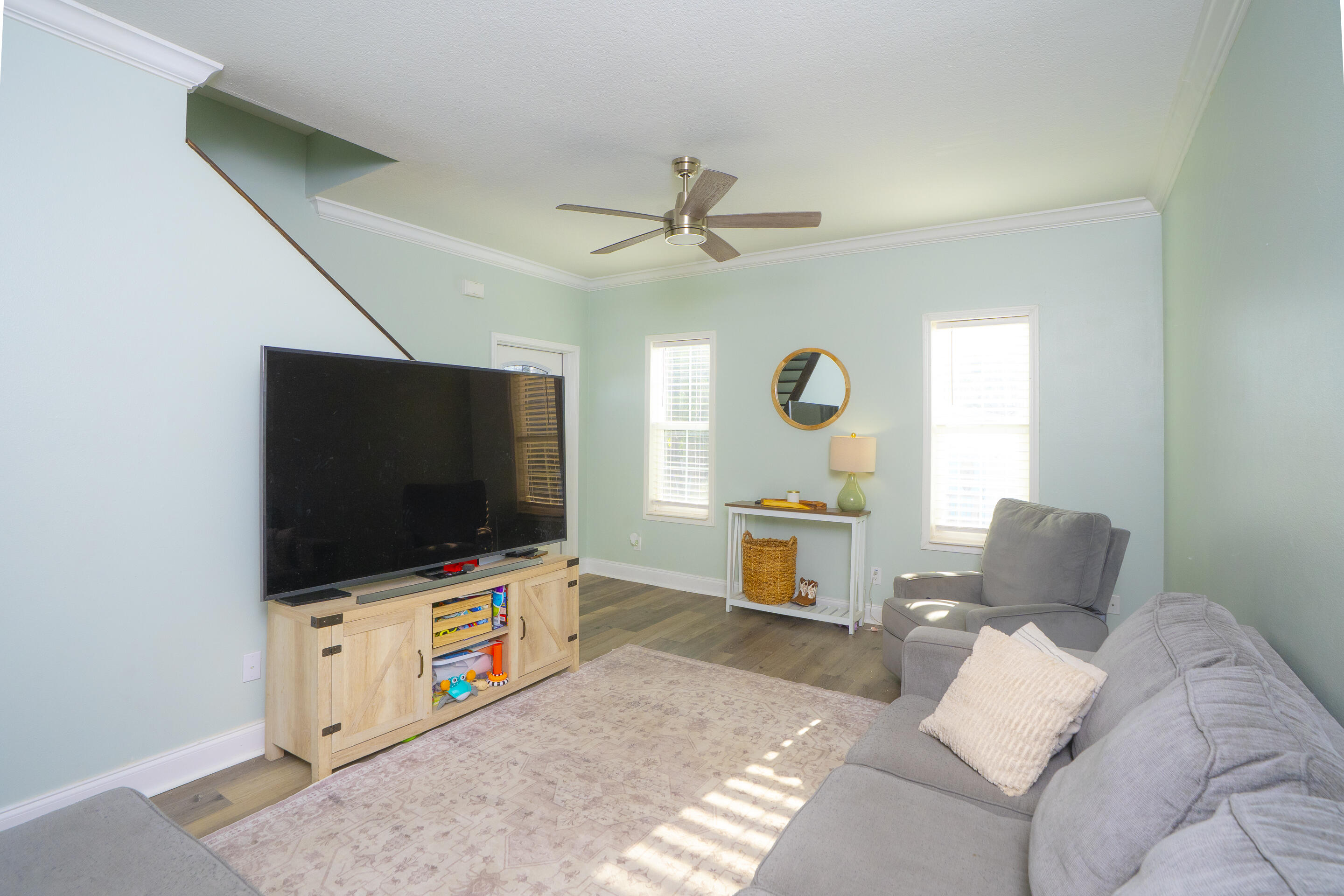 55 Ed Swift Road Key West, FL 33040 - Photo 7 of 23 a living room with furniture and a flat screen tv