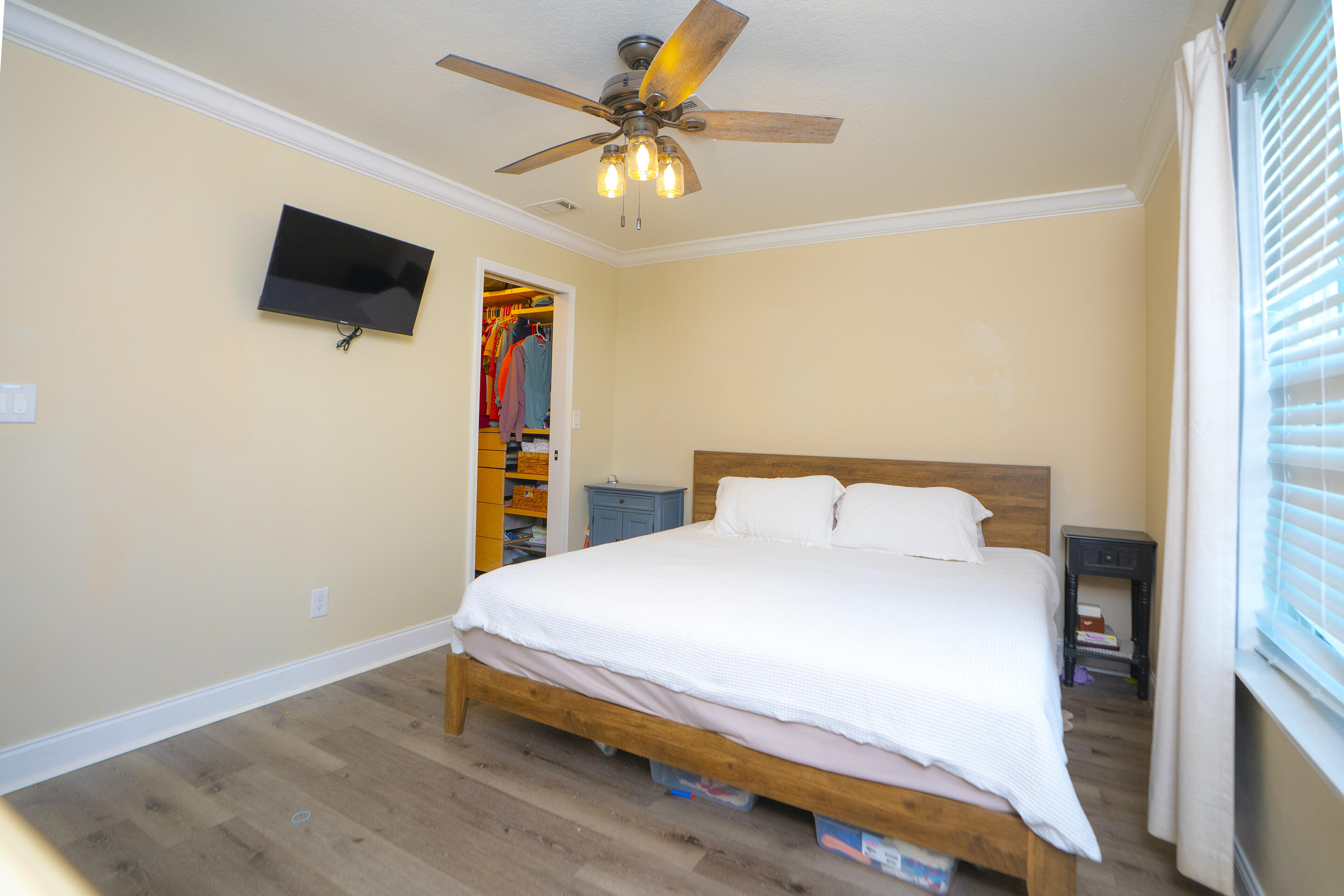 55 Ed Swift Road Key West, FL 33040 - Photo 10 of 23 a bedroom with a bed and a flat screen tv