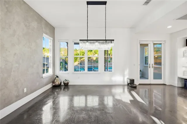 a white stove top oven sitting inside of a kitchen