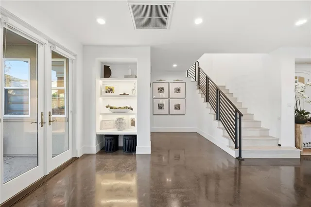 a living room with furniture fireplace and flat screen tv