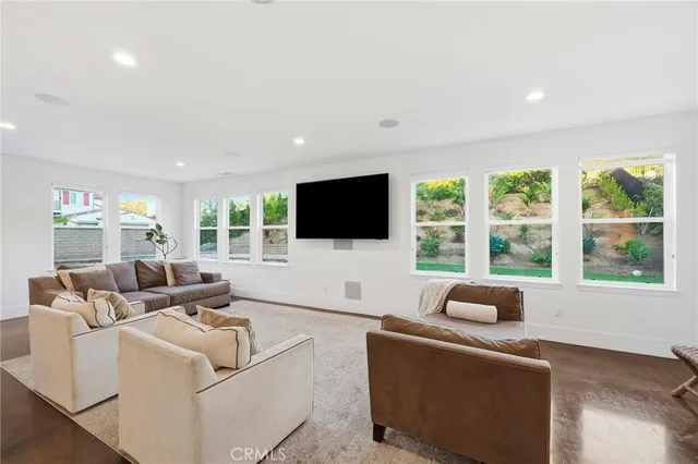 a bedroom with furniture and a bed