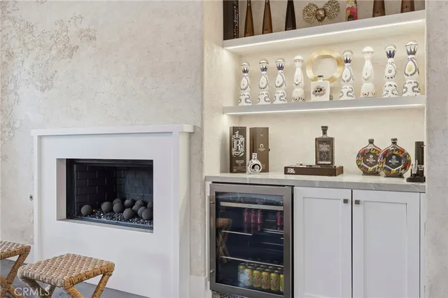 a bedroom with a bed and a chair