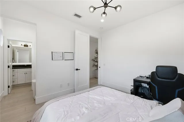 a front view of a house with a yard table and chairs