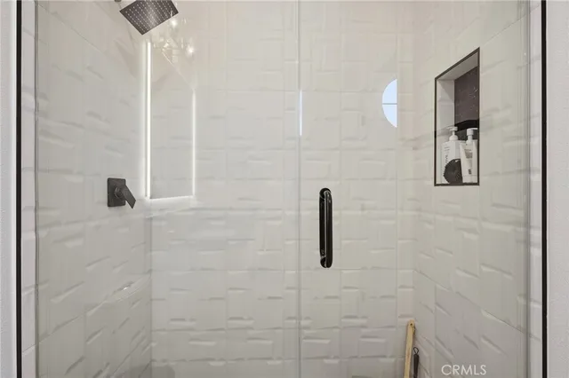 a view of a house with pool and sitting area