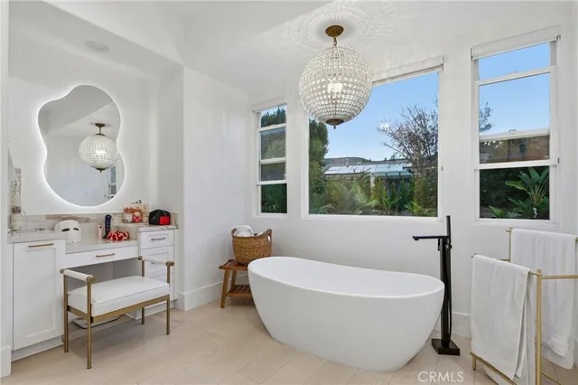 a bathroom with a sink and a window