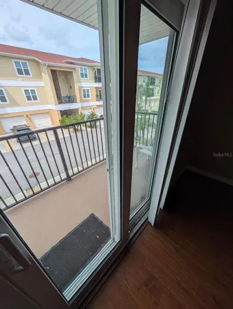 a view of a wooden deck and a lake