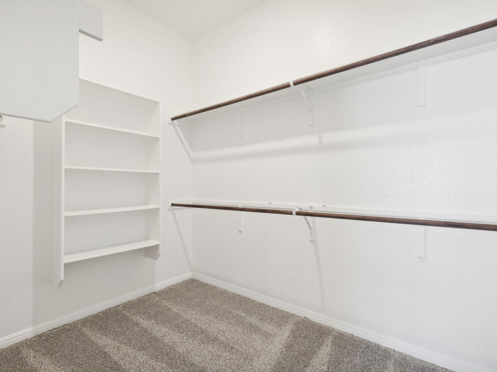 1812 South Main Street Kyle, TX 78640 - Photo 6 of 13 a view of an empty walk in closet