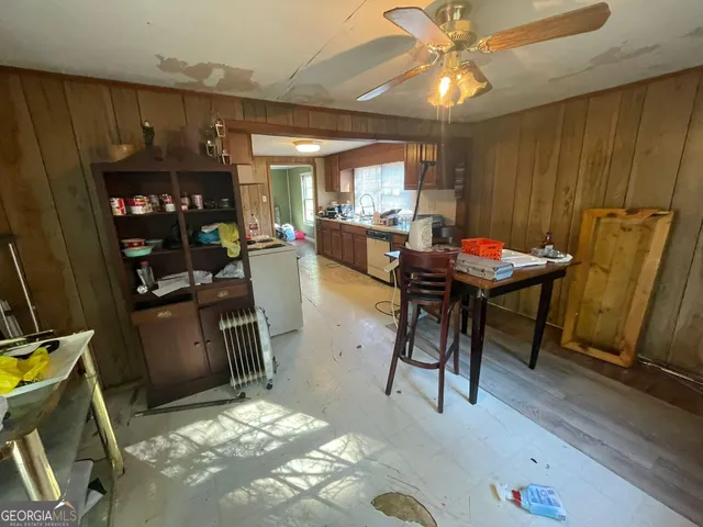 a workspace with furniture and window