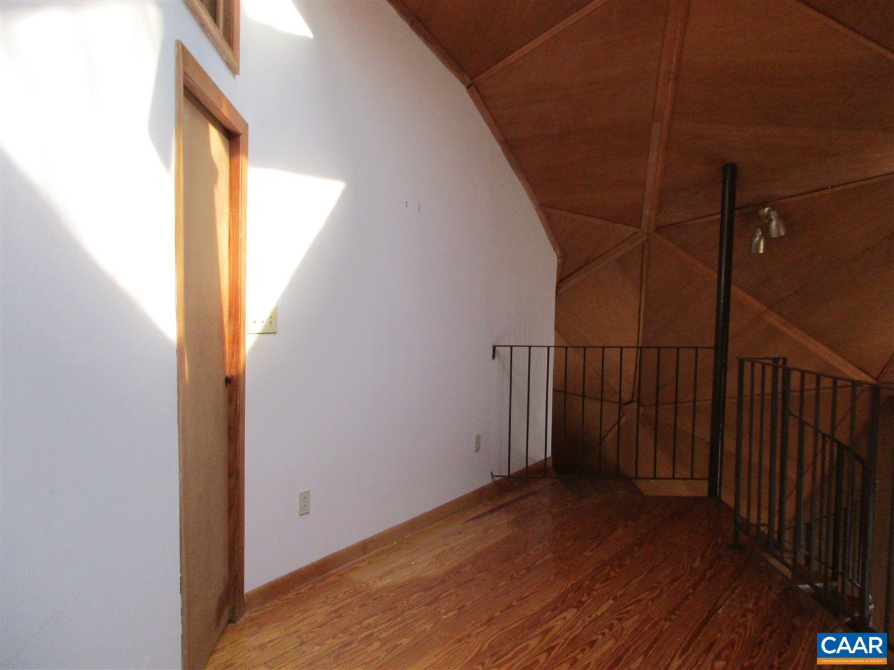 45 Dogleg Road Palmyra, VA 22963 - Photo 3 of 9 a view of a hallway with wooden floor and a window