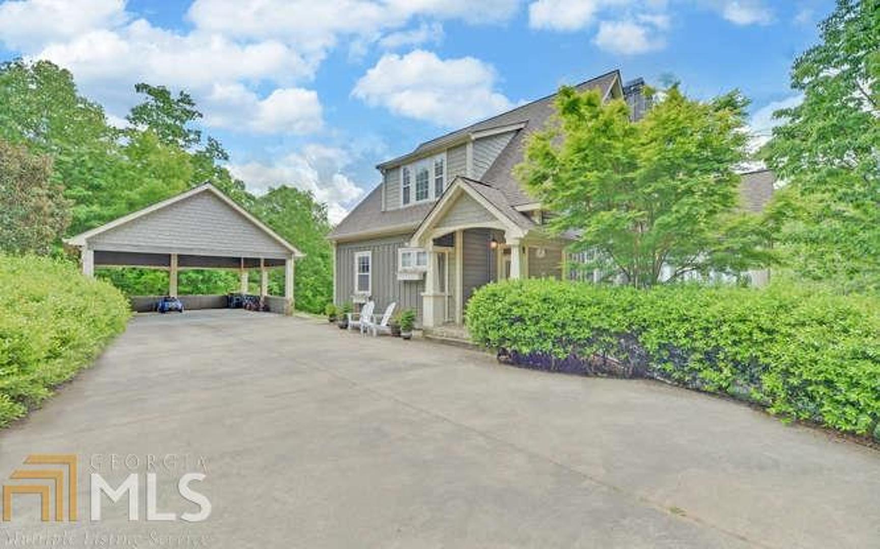 566 Heyden Ridge Drive Clarkesville, GA 30523 - Photo 1 of 1 a front view of a house with a garden