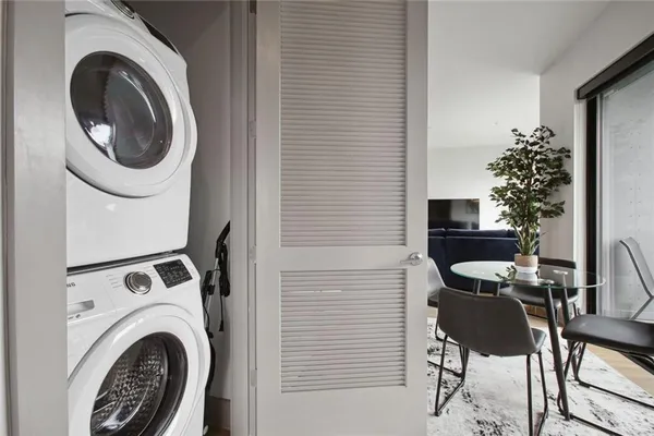 a view of a dining room with furniture and a fireplace