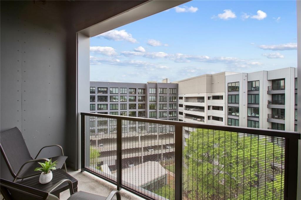 1050 Howell Mill Road, Unit 2 Atlanta, GA 30318 - Photo 8 of 17 a view of a balcony with chair