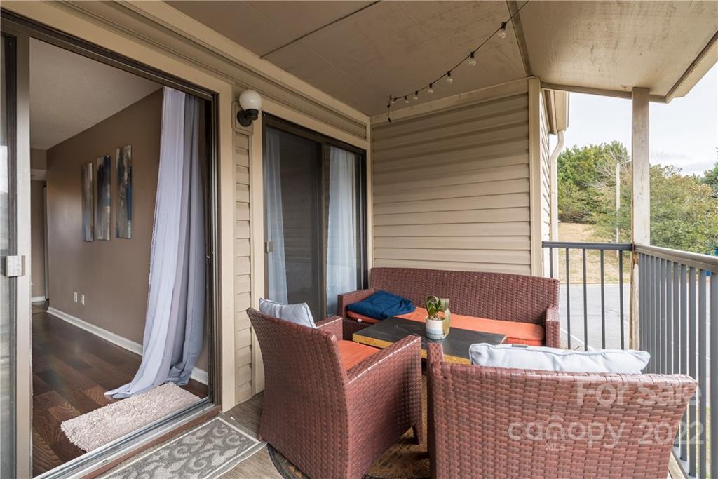 11054 Running Ridge Road Charlotte, NC 28226 - Photo 13 of 22 a outdoor living space with furniture and a window