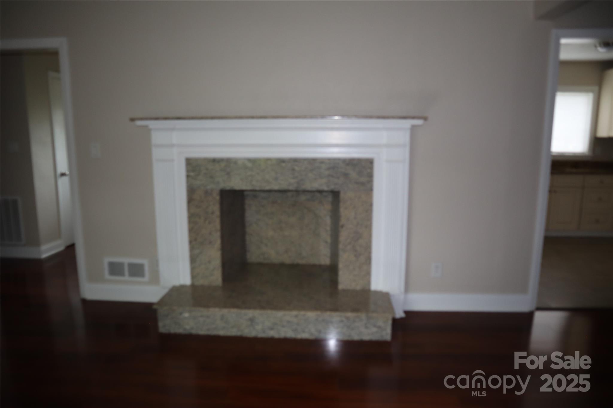 1703 Tyvola Road Charlotte, NC 28210 - Photo 15 of 17 a living room with a fireplace